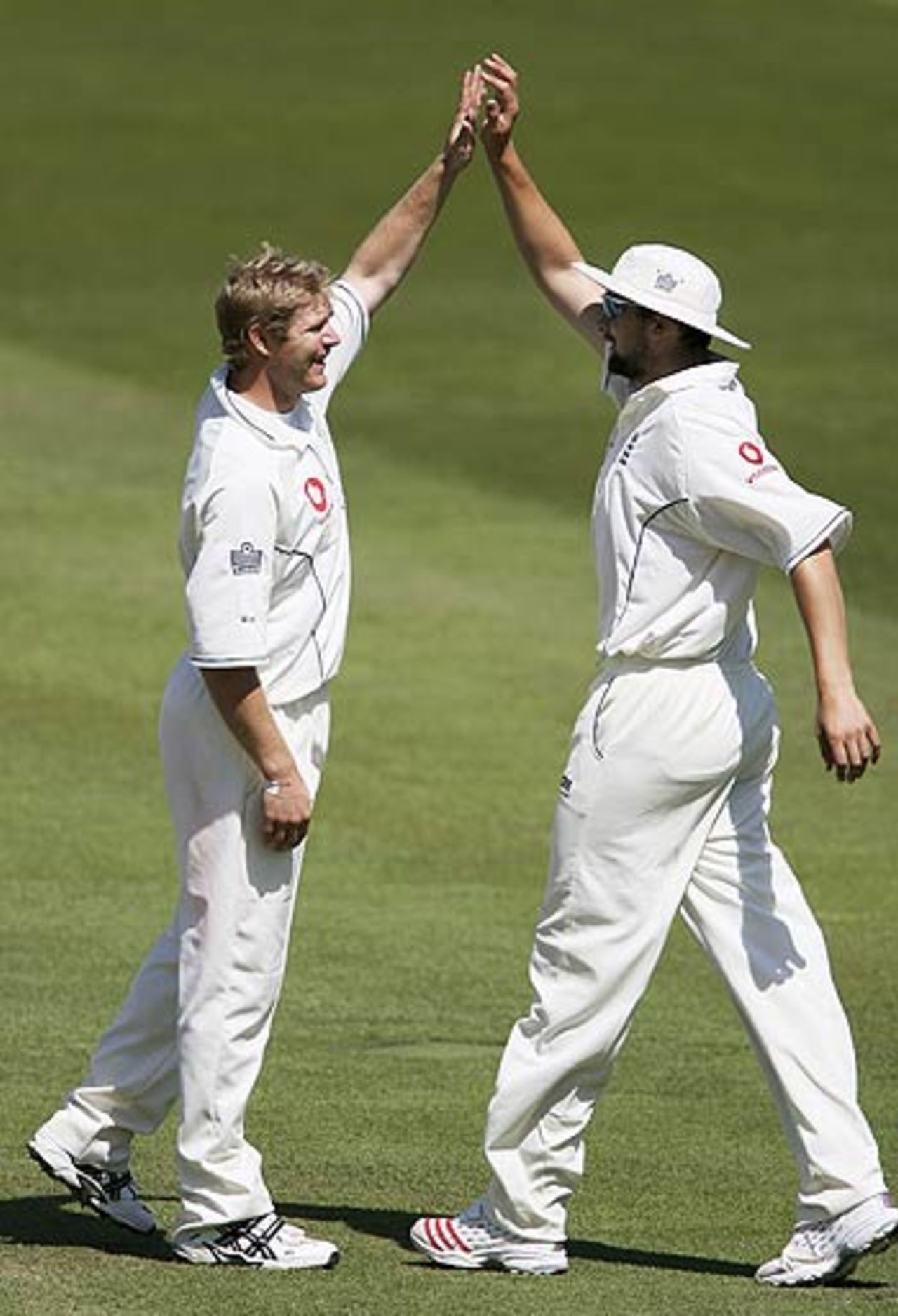 Matthew Hoggard and Steve Harmison celebrate the early inroad on the third day, England v Pakistan, 1st Test, Lord's, July 15, 2006