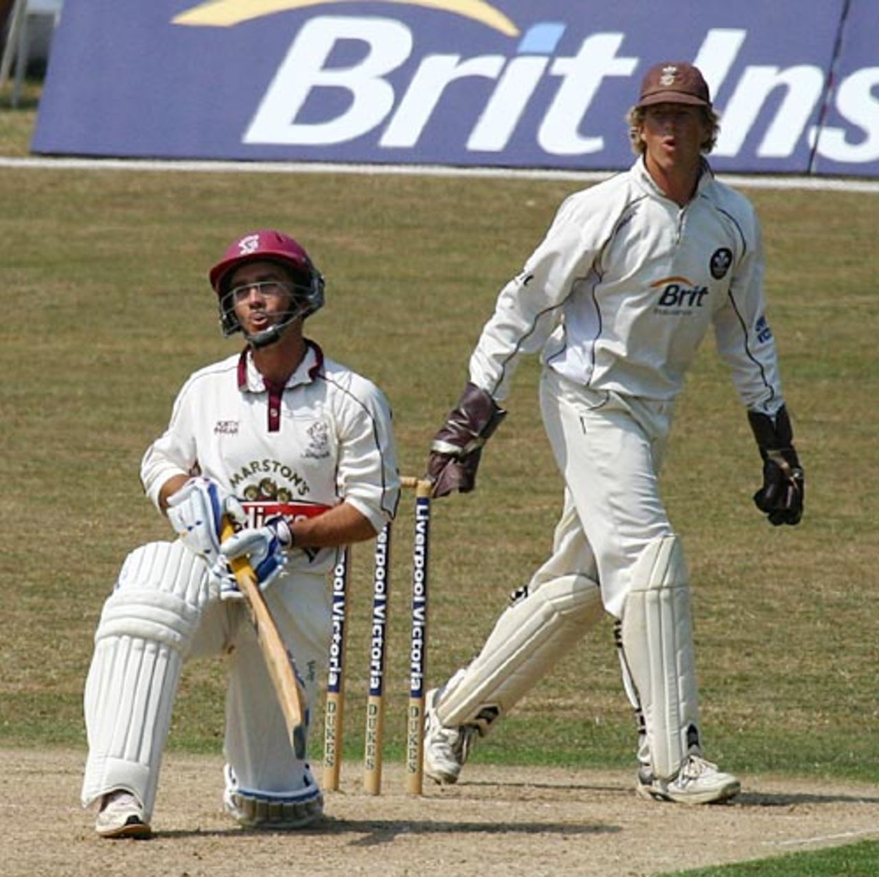 The oohs have it ... Justin Langer enjoys a stroke of luck, Surrey v Somerset, Guildford, July 19, 2006