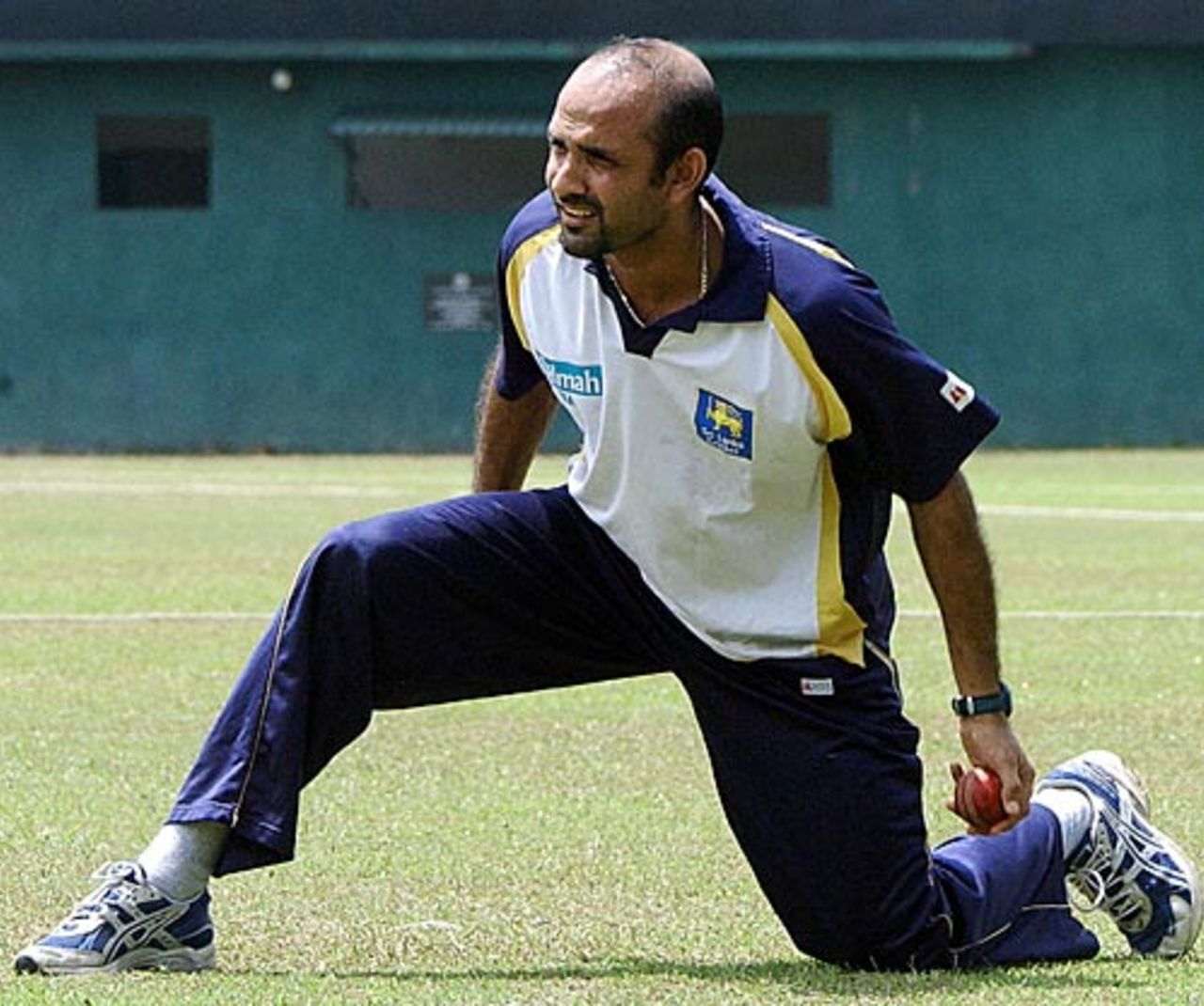 Marvan Atapattu gingerly goes through a warm-up exercise, Colombo, July 21, 2006
