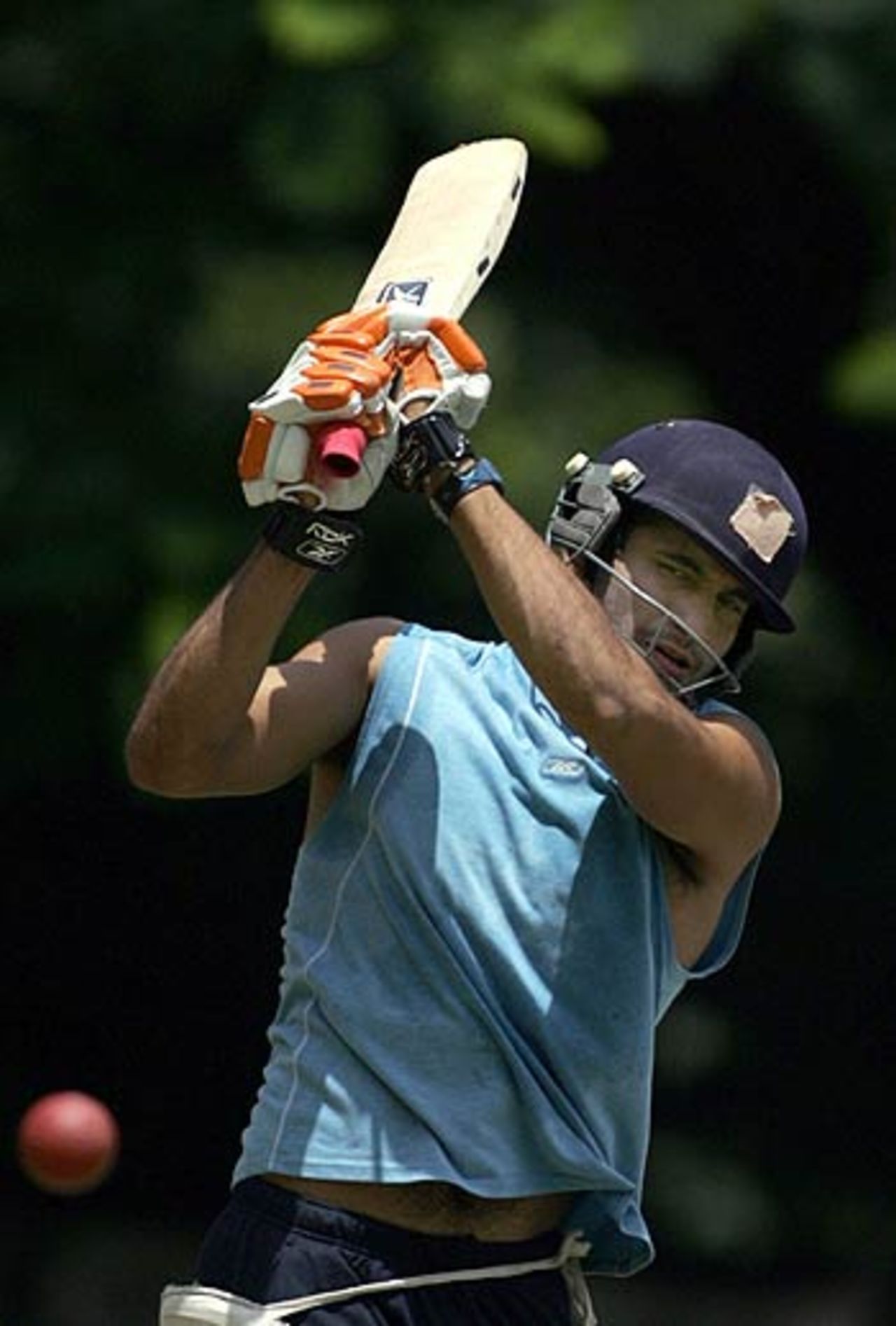Irfan Pathan in action at the National Cricket Academy, Bangalore, July 24, 2006
