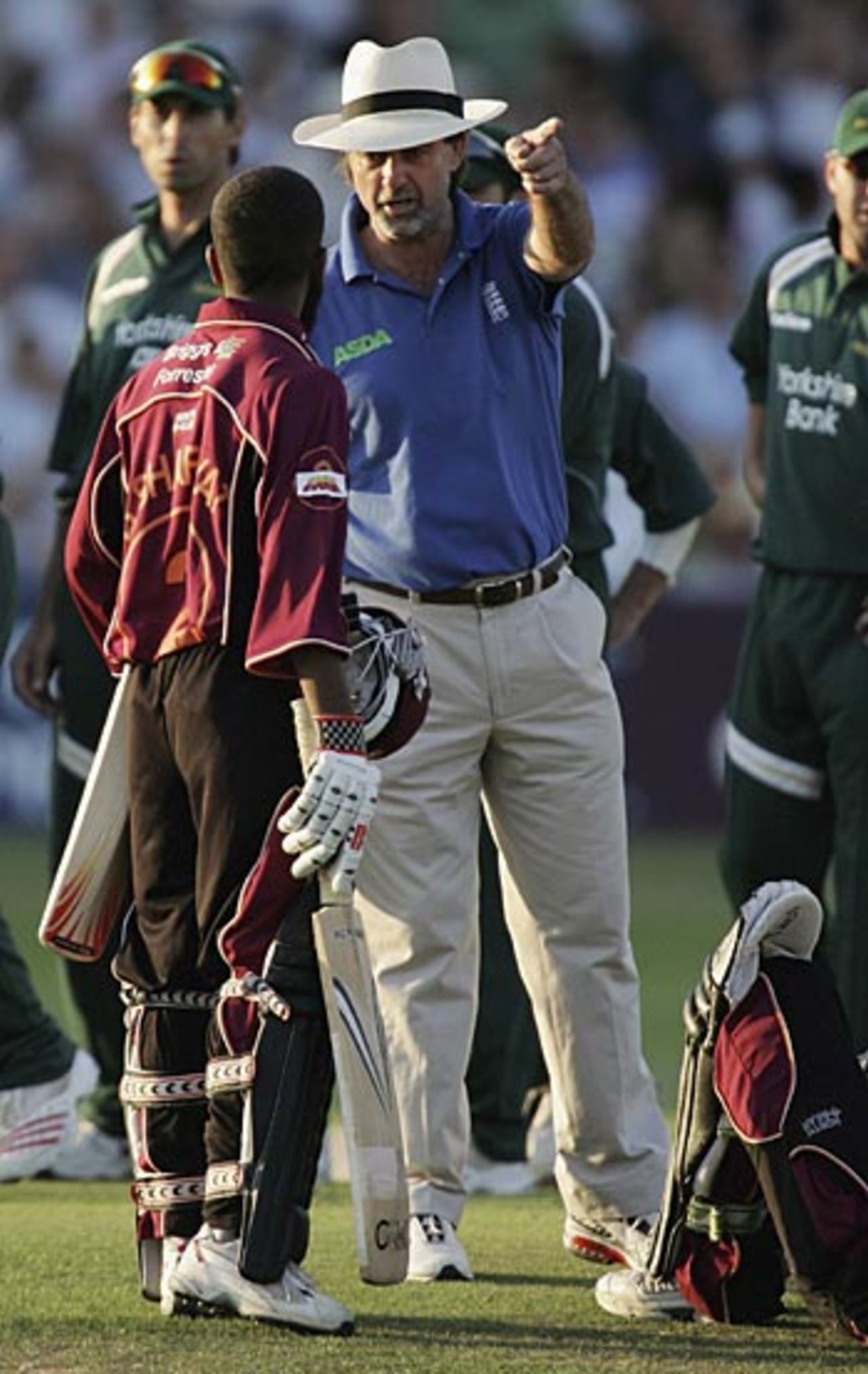 Peter Willey sends Bilal Shafayat on his way after Rikki Wessels was run out after a mix-up and had to be carried off the field on a stretcher, Nottinghamshire v Northamptonshire, Twenty20 Quarter-final, Trent Bridge, July 24, 2006