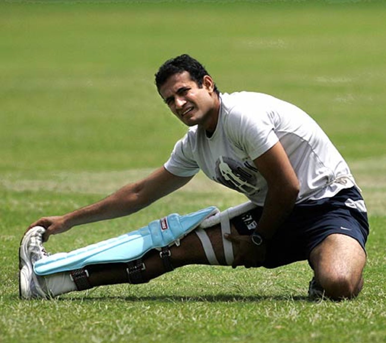 Irfan Pathan stretches before a net session at the National Cricket Academy, Bangalore, July 25, 2006
