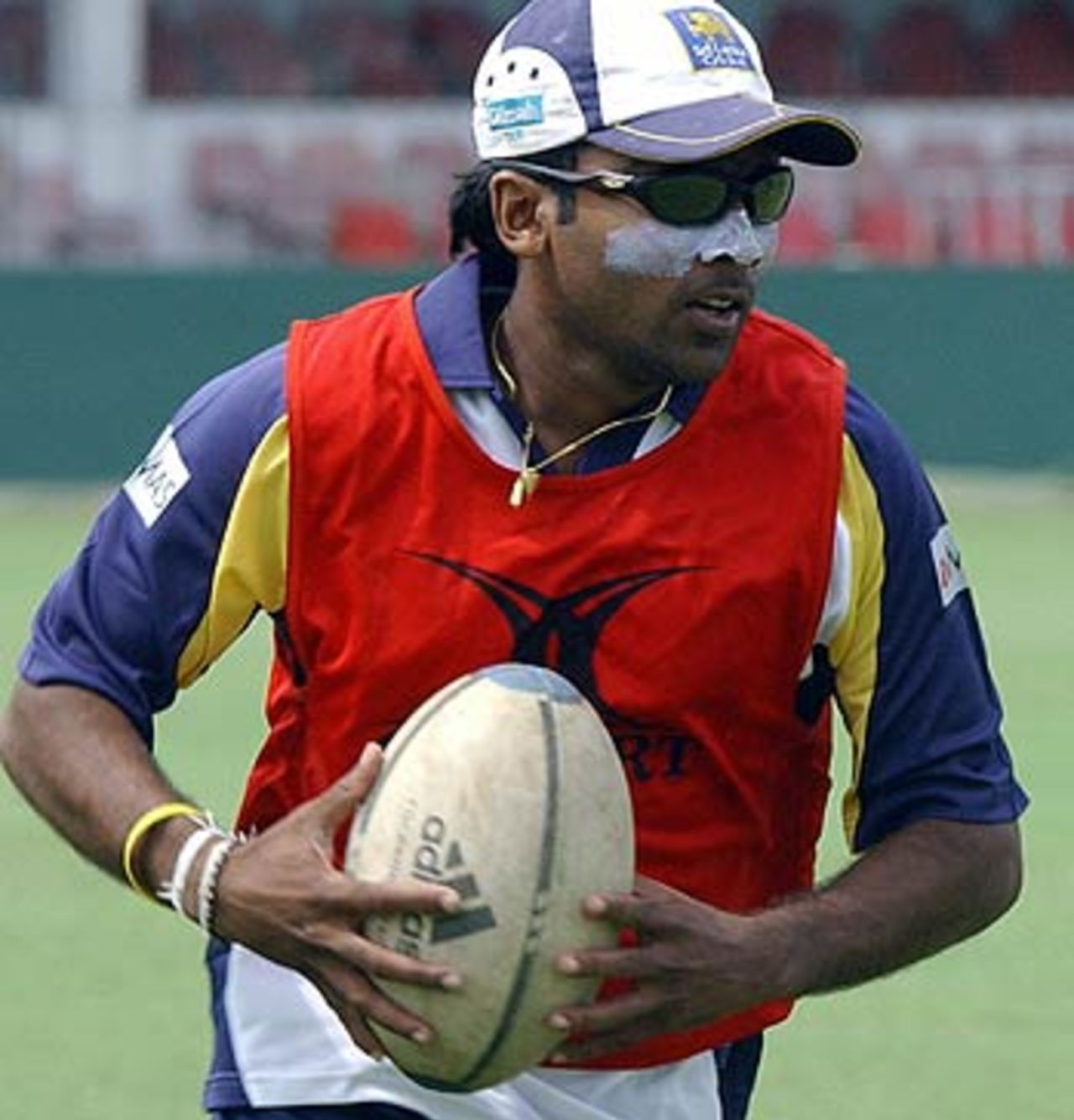 Mahela Jayawardene tunes his rugby skills during a practice session in Colombo, South Africa in Sri Lanka, July 26, 2006