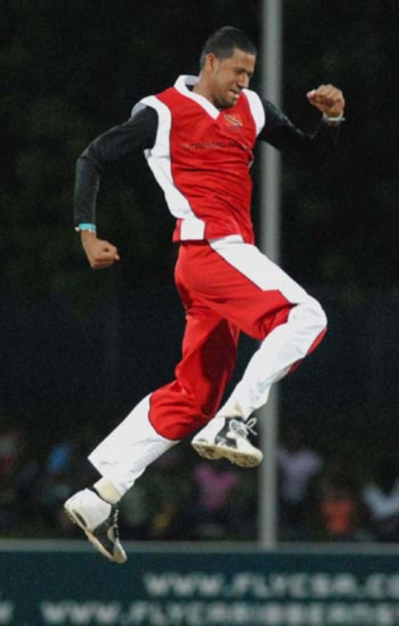 Rayad Emrit celebrates one of his two wickets, Cayman Islands v Trinidad & Tobago, Stanford 20/20, July 25, 2006 	