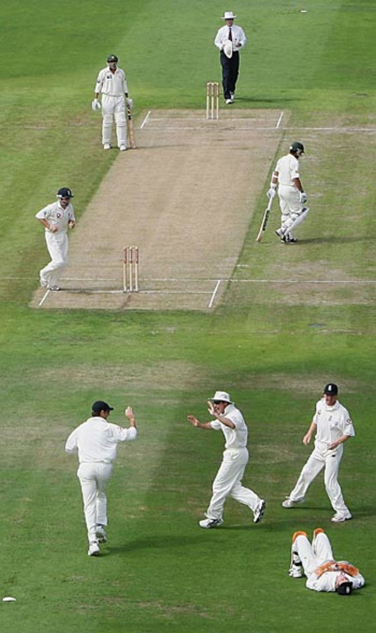 Geraint Jones lies on the floor a relieved man after diving in front of Marcus Trescothick at first slip who took a fine catch, England v Pakistan, 2nd Test, Old Trafford, July 27, 2006
