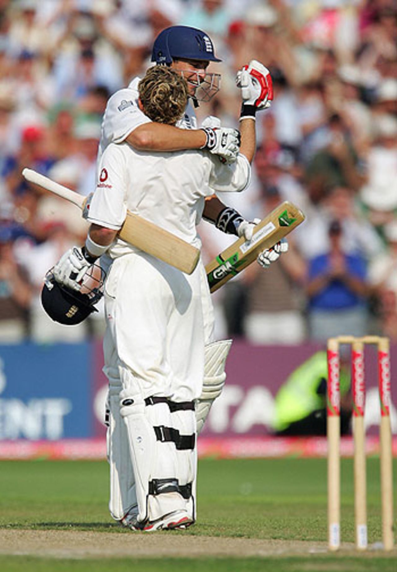 Ian Bell is embraced by Steve Harmison after his century, England v Pakistan, 2nd Test, Old Trafford, July 28, 2006