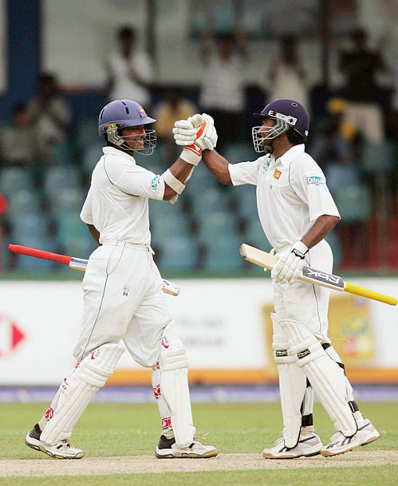 It's celebration time for Mahela Jayawardene and Kumar Sangakkara, as Sri Lanka pile on the runs, Sri Lanka v South Africa, 1st Test, Sinhalese Sports Club, Colombo, 2nd day
