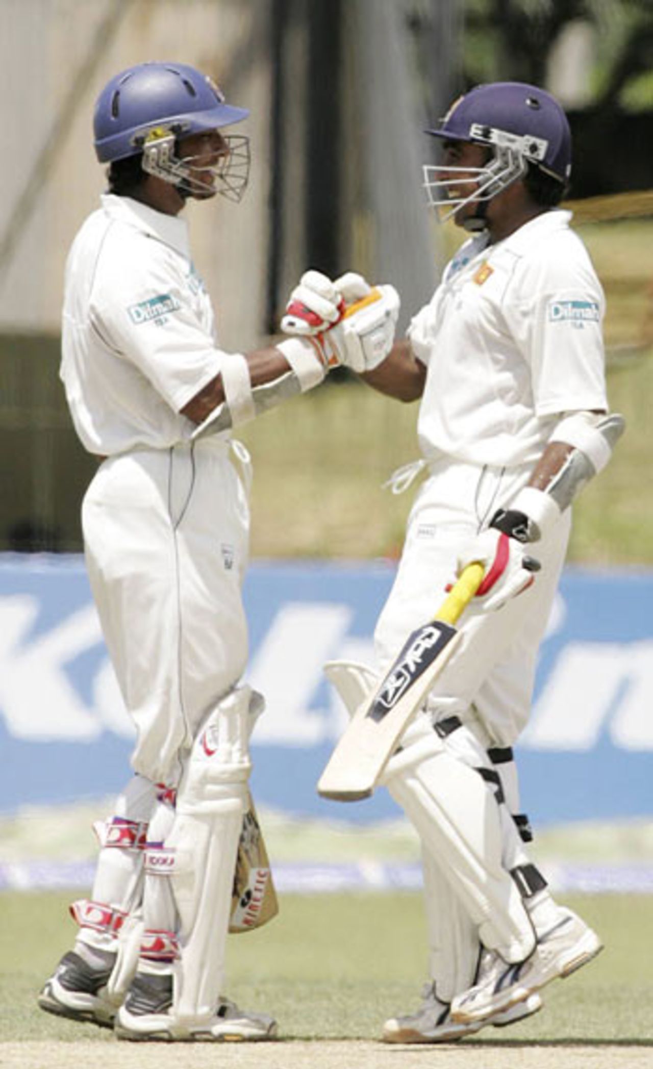 Kumar Sangakkara and Mahela Jayawardene have a good laugh as the records tumble