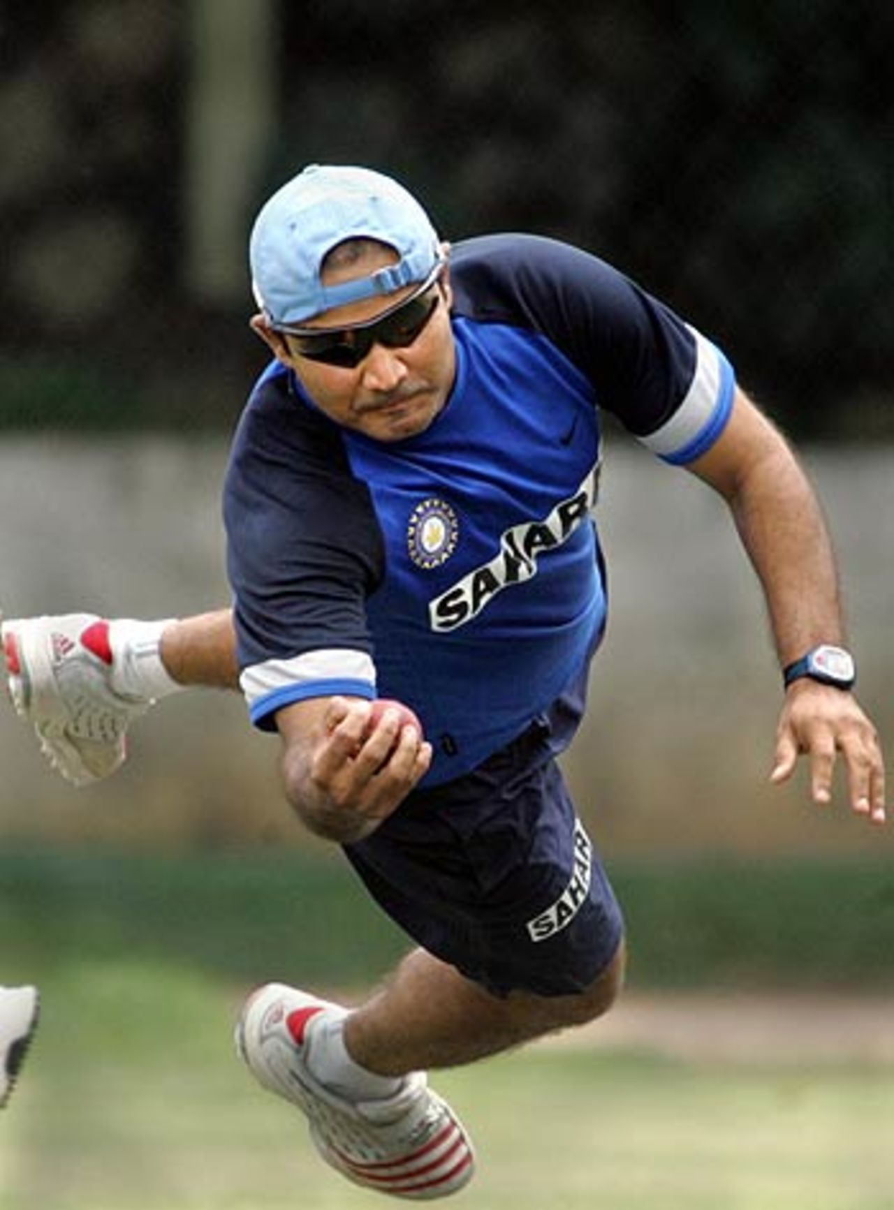 Virender Sehwag dives to take a catch in the camp at the National Cricket Academy, Bangalore, August 1, 2006