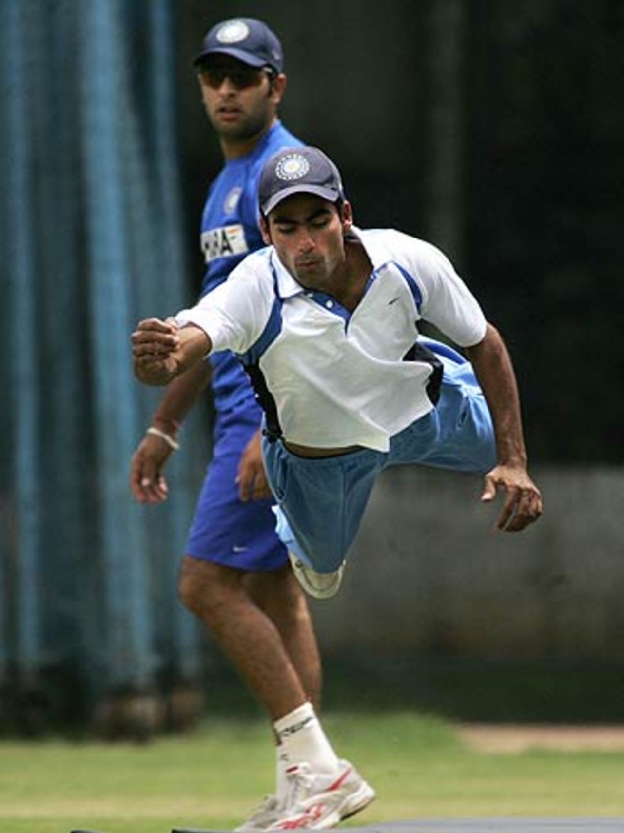 Mohammad Kaif attempts to pluck the ball out of thin air as Yuvraj Singh looks on, National Cricket Academy, Bangalore, August 1, 2006