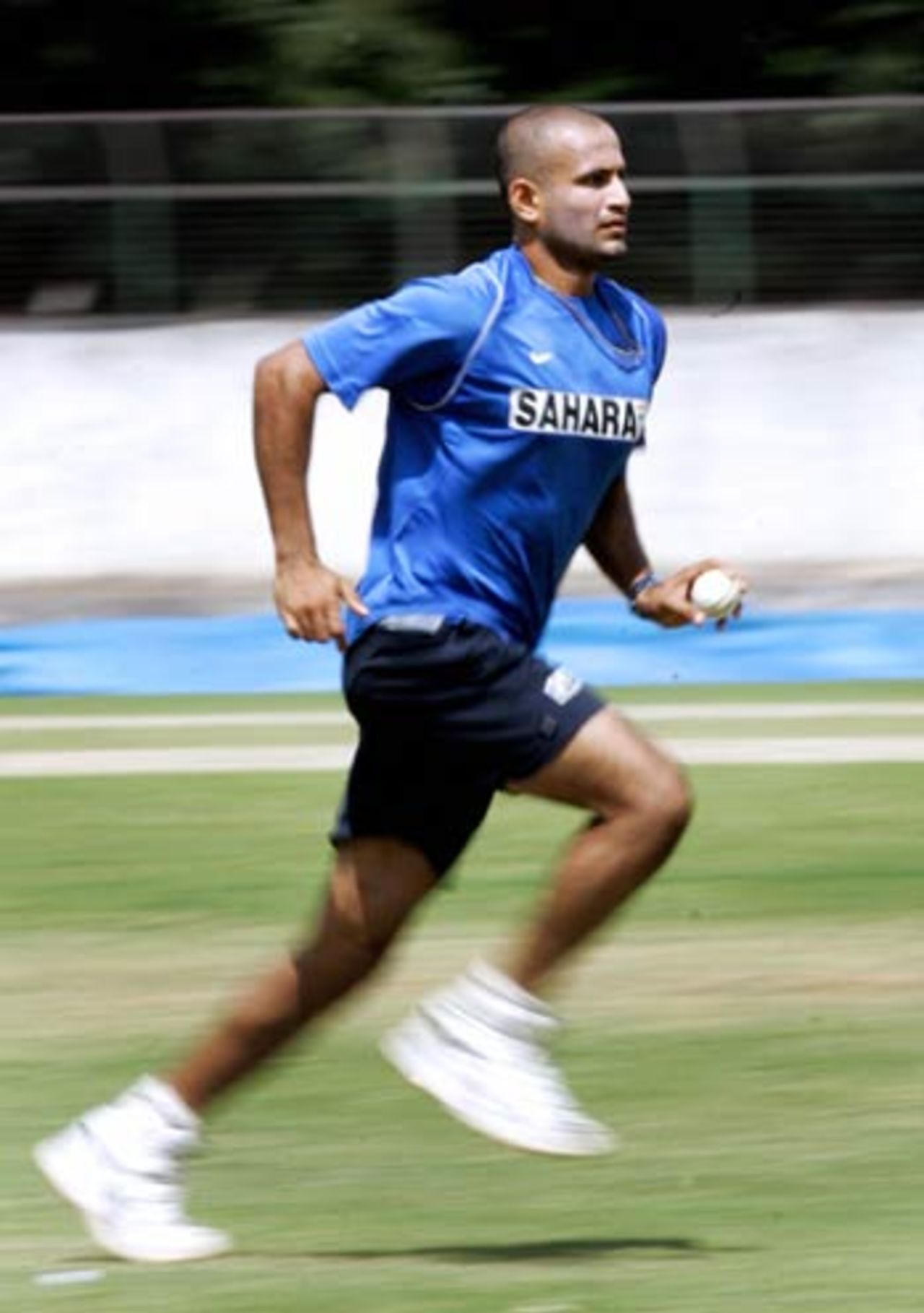 Irfan Pathan runs in to bowl in the preparatory camp in Bangalore, August 7, 2006
