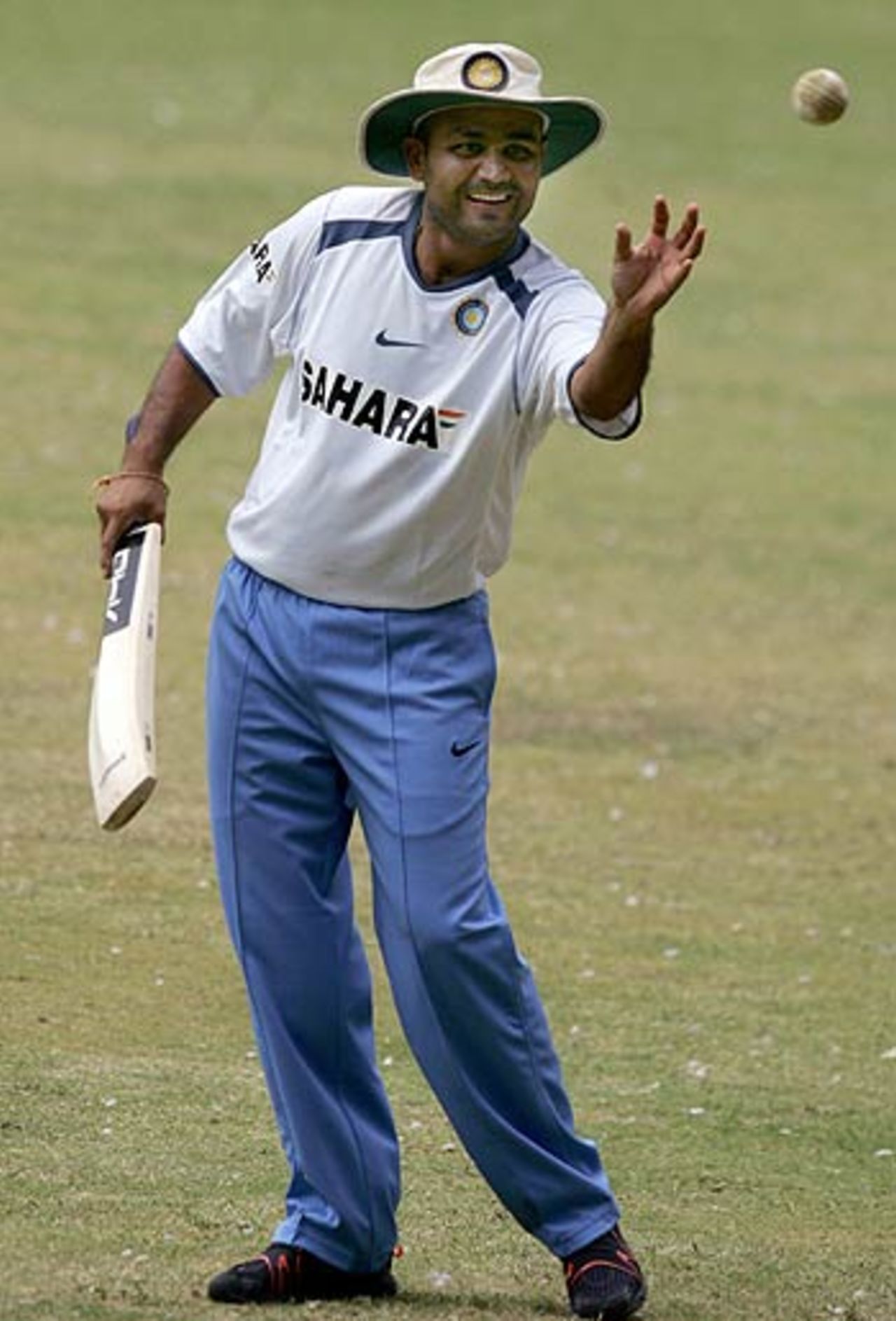 Virender Sehwag dishes out the fielding practice, National Cricket Academy, Bangalore, August 9, 2006