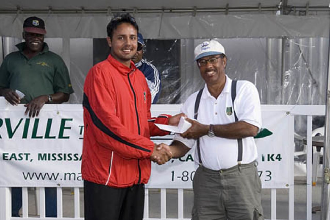 Umar Bhatti receives the Marville Travel award from Errol Townshend President of the Ontario Cricket Association, Intercontinental Cup Match, Canada v Bermuda, August 12-15, 2006