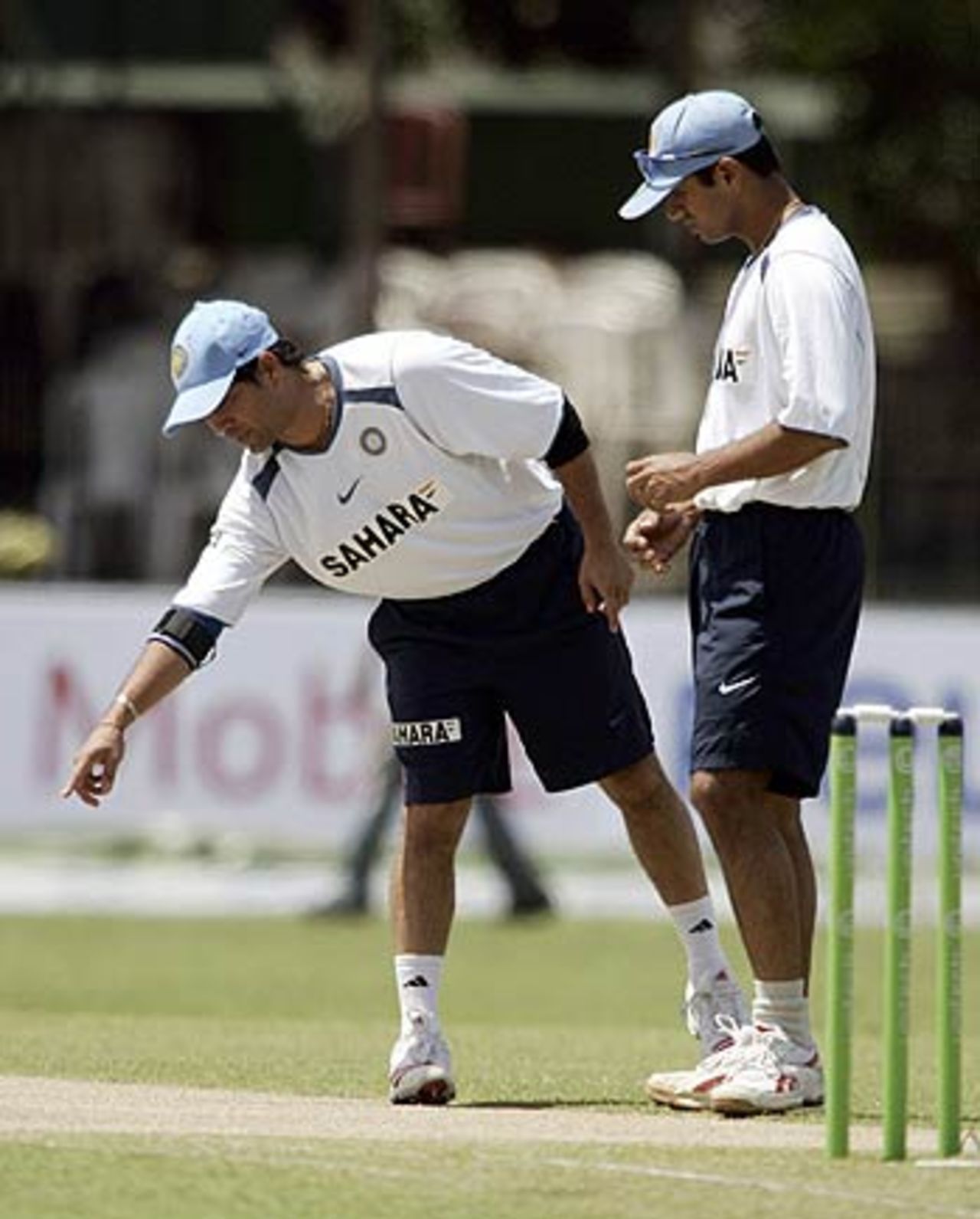 Sachin Tendulkar and Rahul Dravid stare intently at the pitch, Sri Lanka v India, 1st ODI, Sinhalese Sports Club, Colombo, August 18, 2006