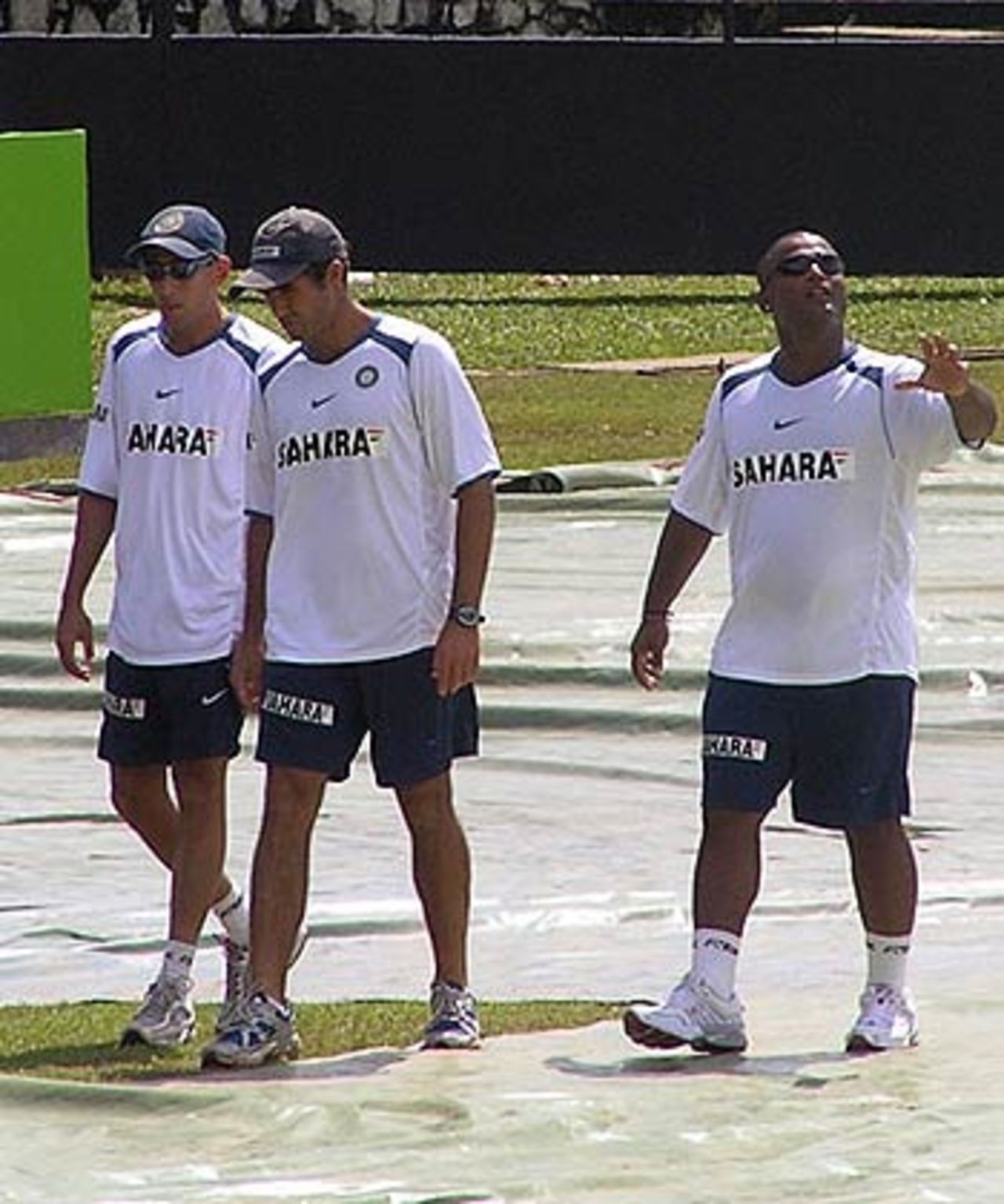 Ajit Agarkar, Irfan Pathan and Ramesh Powar take a stroll over the covers, Sri Lanka v India, 1st ODI, Colombo, August 19, 2006