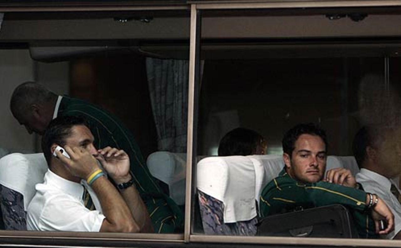 Andre Nel and Mark Boucher wait for the bus to take them to the airport, Colombo, August 17, 2006