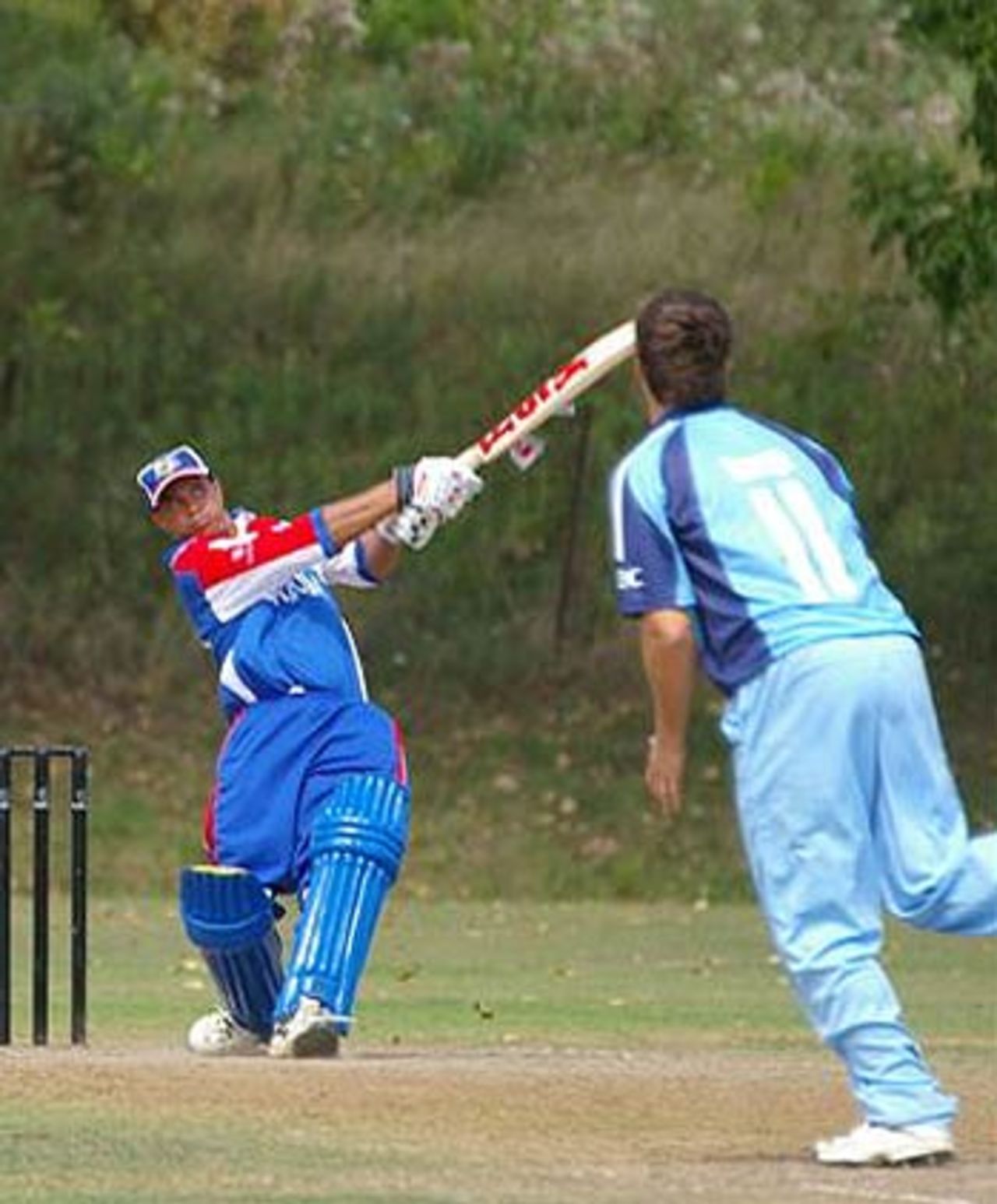 Lionel Cann slams one of his five sixes during his undefeated 139, Argentina v Bermuda, ICC World Cricket League Americas Region, 3rd match, King City, August 22, 2006 
