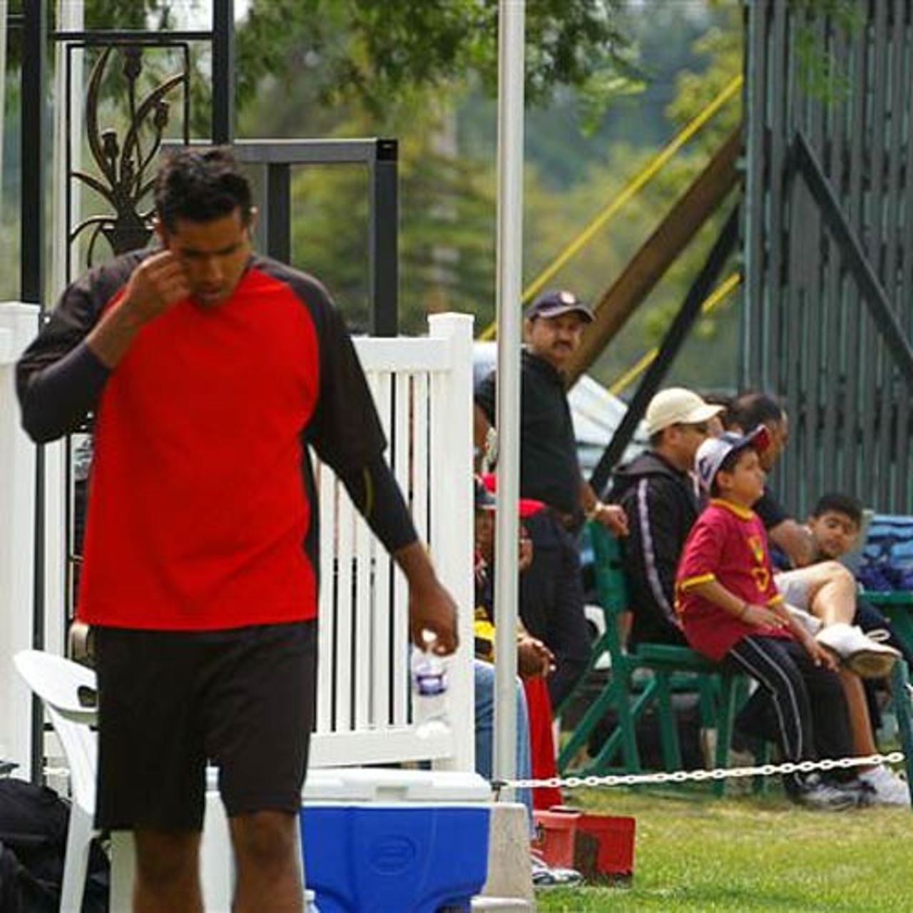 Kevin Sandher, the Canadian slow left-arm bowler, seems deep in thought after taking three wickets for 24 in his side's ten-wicket victory over USA, at Maple Leaf Cricket Club, August 26, 2006