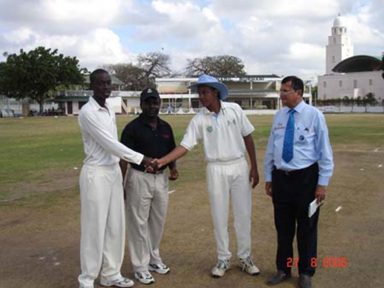 Tanzania captain, Hamisi Abdallah shaking hands with Botswana captain, Tshepo Mhoyzo while Tom Tikolo and Subhsh Modi look on, ICC World Cricket League Africa Region Division Two