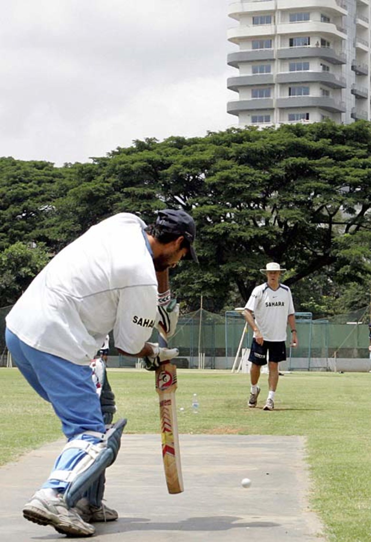 Greg Chappell watches Mohammed Kaif bat during a training session at The National Cricket Academy (NCA), Bangalore, August 30, 2006