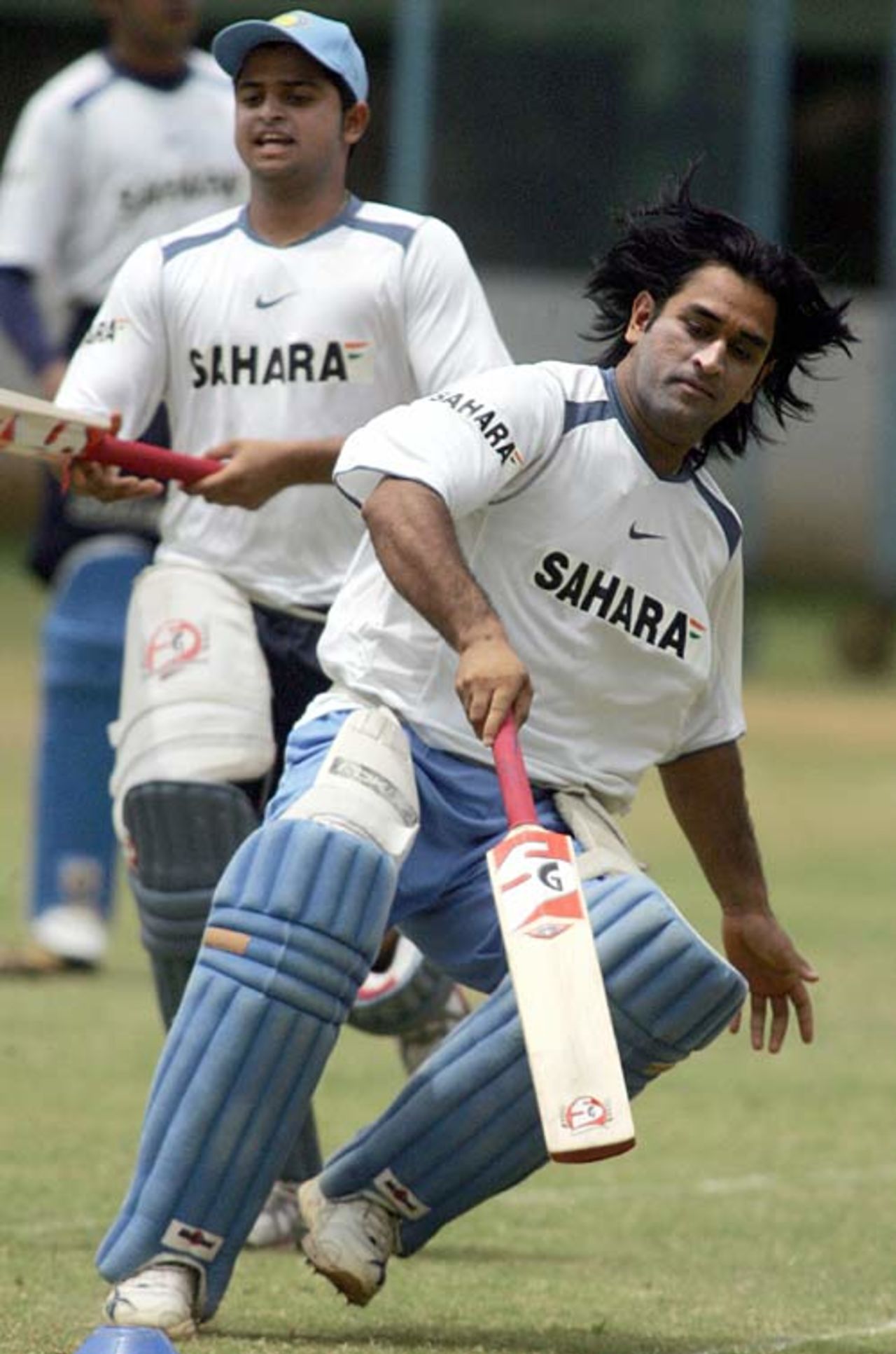 Mahendra Singh Dhoni runs between the wickets, Bangalore, September 2, 2006
