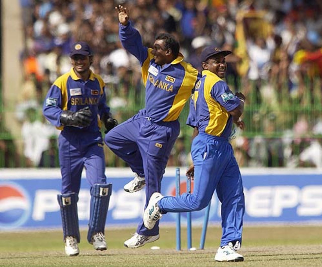 Sri Lankan cricketers celebrate a strike against Australia, Sri Lanka v Australia, 2nd Semi-final, ICC Champions Trophy, Colombo, September 27, 2002
