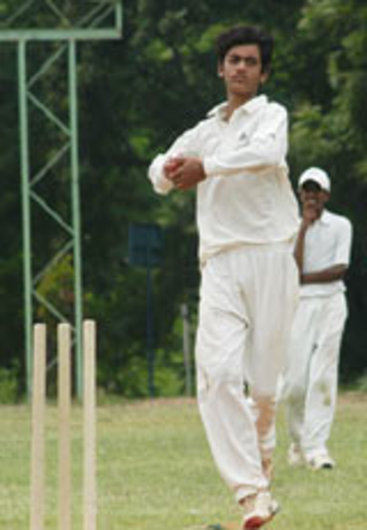 Mohammad Ayazuddin, son of Mohammad Azharuddin, skips in to bowl