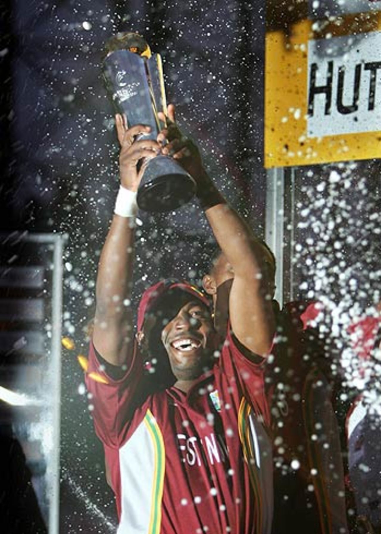 Brian Lara holds aloft the ICC Champions Trophy after his team beat England in the final, The Oval, September 25, 2004