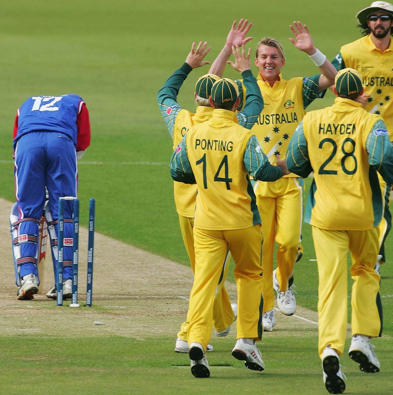 Brett Lee is congratulated after bowling Mark Johnson second ball, Australia v USA, 5th match, ICC Champions Trophy, Southampton, September 13, 2004