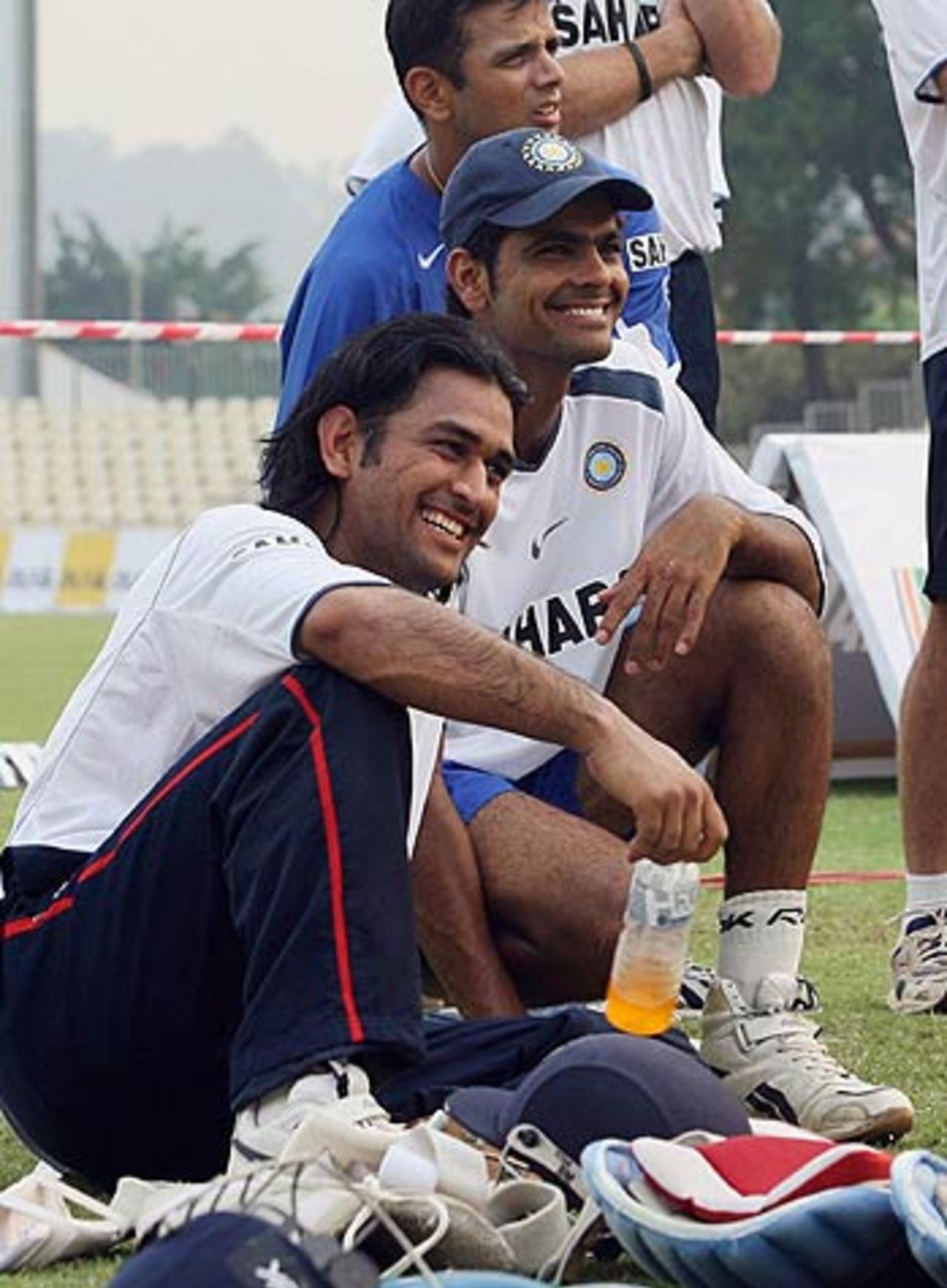Mahendra Singh Dhoni and RP Singh share a light moment, Kinrara Academy Oval, Kuala Lumpur, September 13, 2006