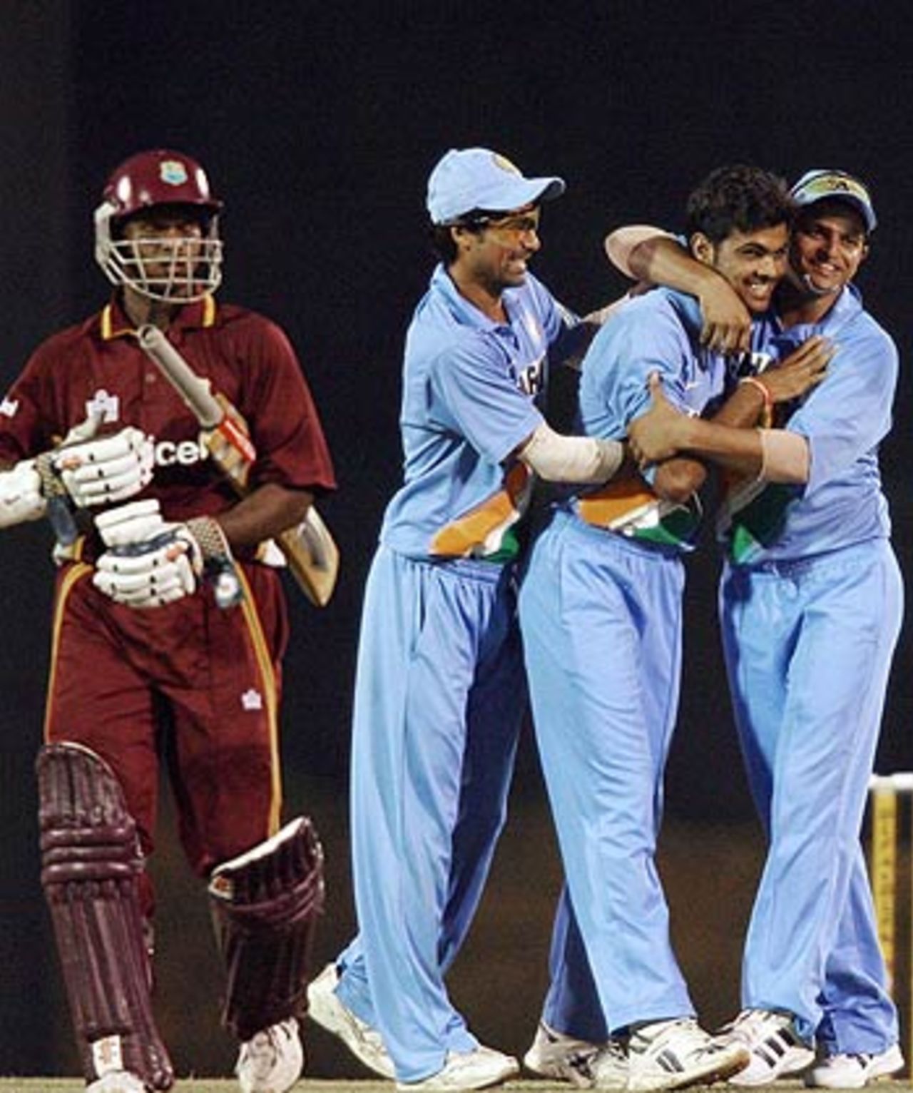 Indian players rush to congratulate RP Singh for dismissing Shivnarine Chanderpaul, India v West Indies, 2nd match, DLF Cup, Kuala Lumpur, September 14, 2006