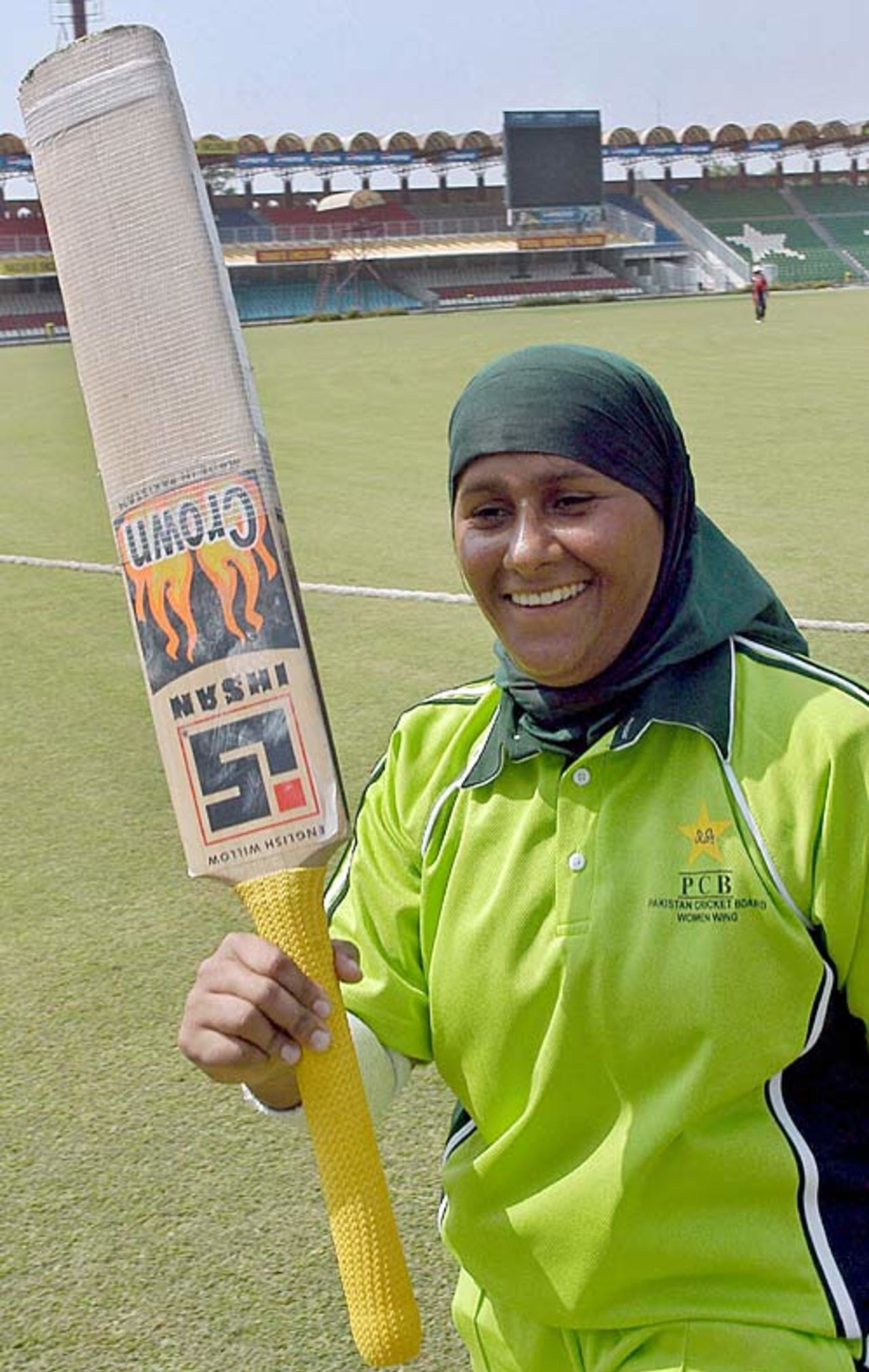 Sana Javed raises her bat after her 121, Pakistan Women v Hong Kong Women, Lahore, September 17, 2006