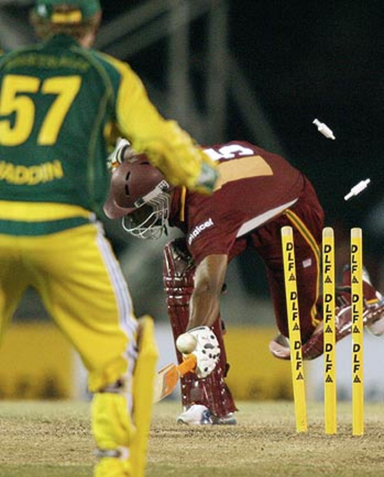 Marlon Samuels falls victim to a Michael Clarke direct hit, Australia v West Indies, DLF Cup, 4th match, September 18, 2006