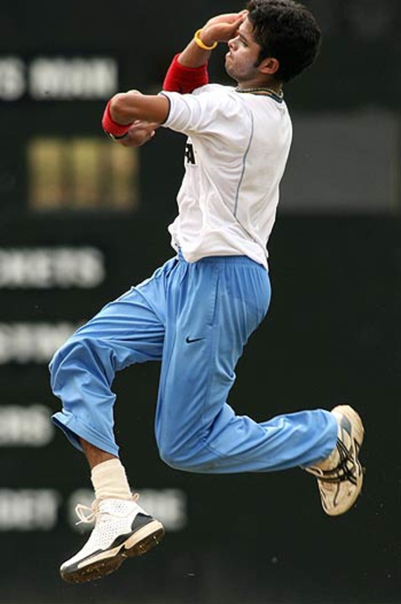 Sreesanth bowls hard in the nets at India's practice session, at the Kinrara Academy Oval, Kuala Lumpur, September 19, 2006
