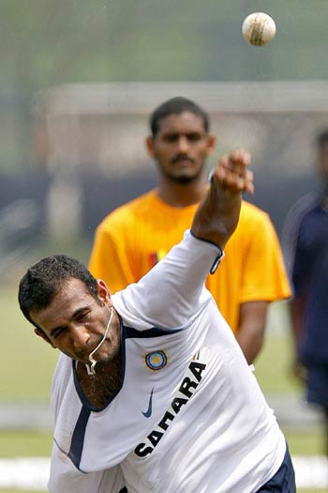 Irfan Pathan sends one down during practice on the eve of the final league match, Kinrara Academy Oval, Kuala Lumpur, September 21, 2006