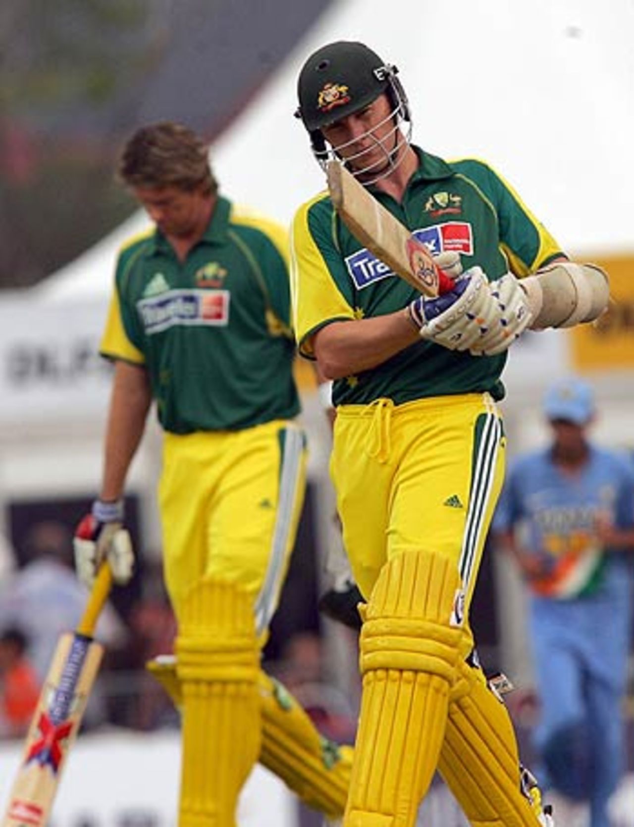 Brett Lee and Glenn McGrath walk off after Australia were bowled out, India v Australia, DLF Cup, 6th match, Kinrara Academy Oval, September 22, 2006