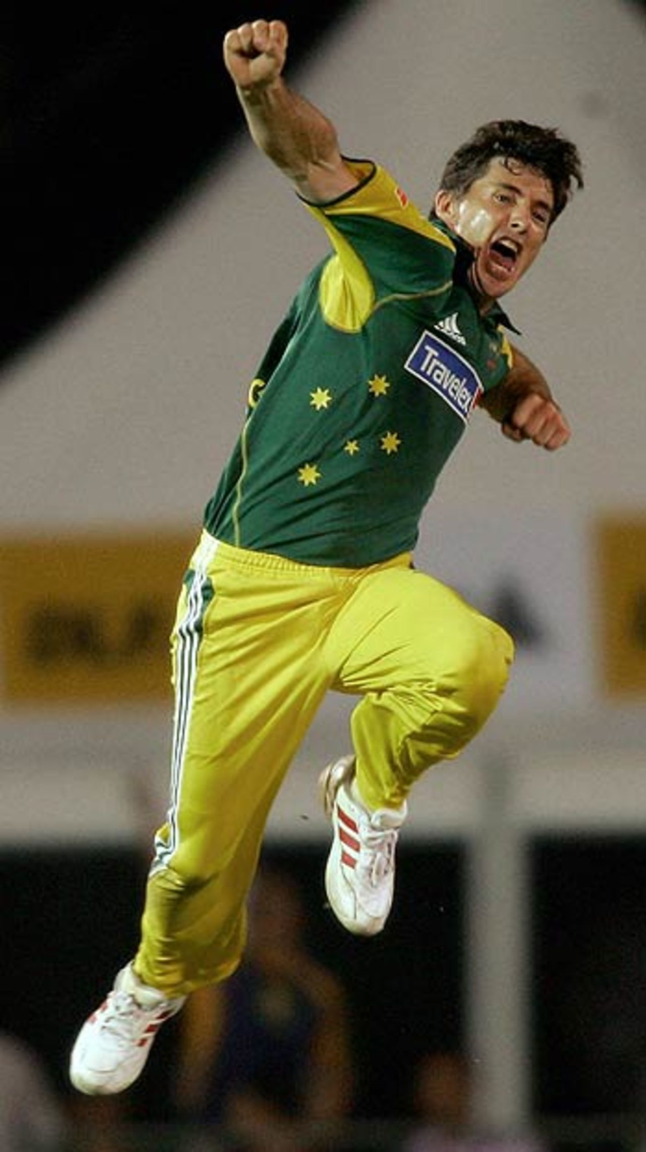 Brad Hogg whoops it up after bowling Suresh Raina, India v Australia, DLF Cup, 6th match, Kinrara Academy Oval, September 22, 2006