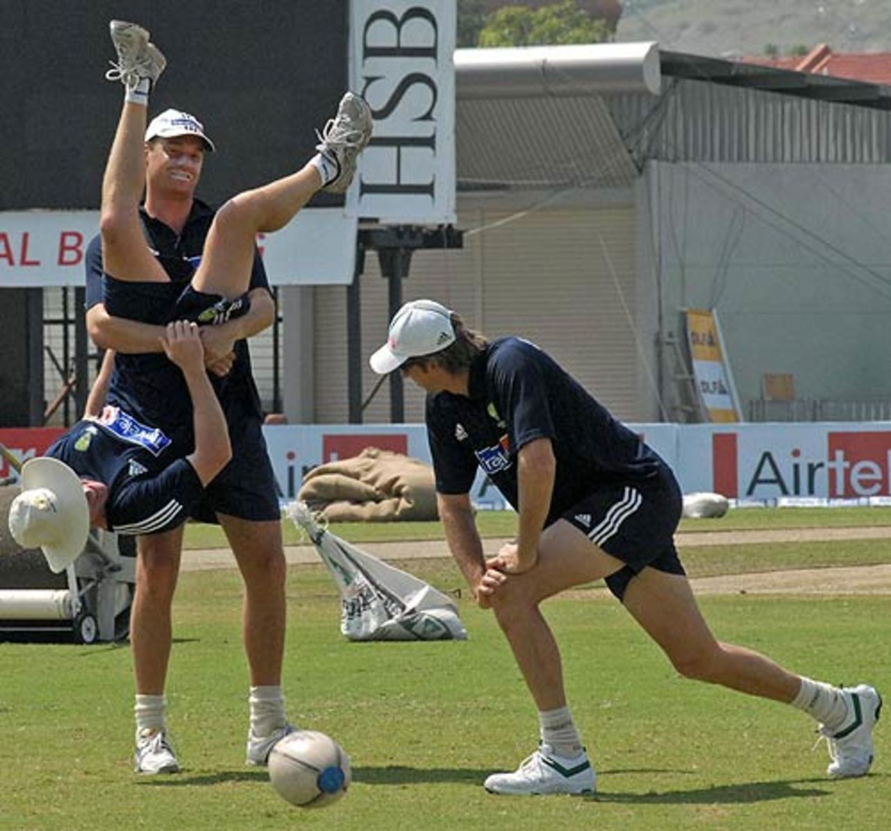 Stuart Clark holds the trainer upside down, DLF Cup, Kuala Lumpur, September 22, 2006