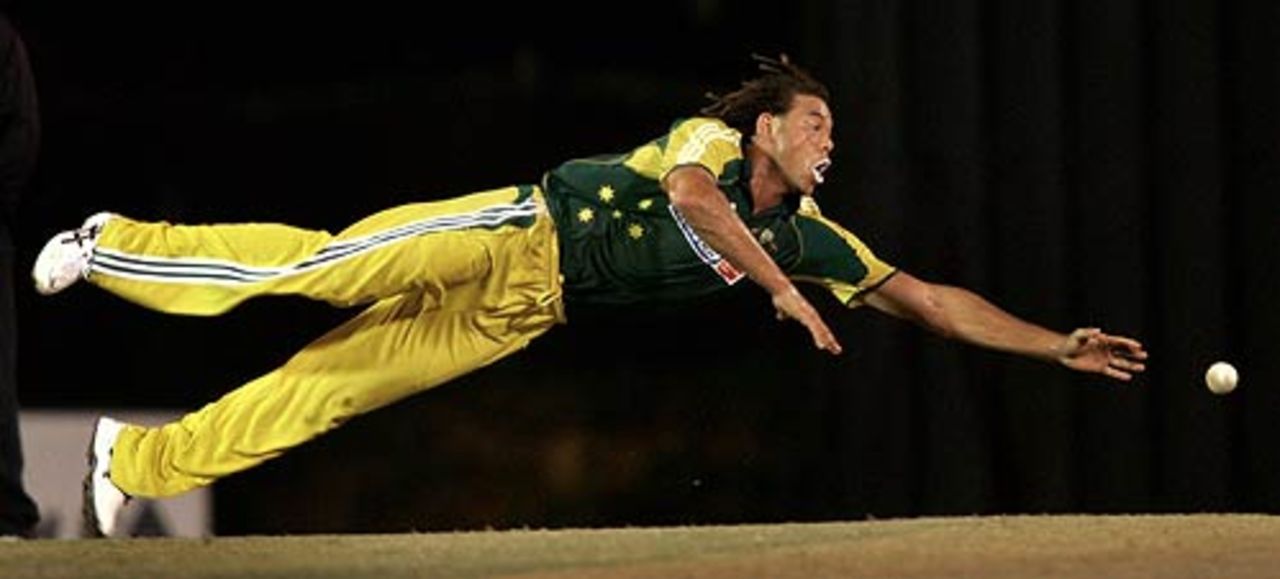 Andrew Symonds makes a diving save, Australia v India, 6th match, DLF Cup, Kinrara Oval, Kuala Lumpur, September 22
