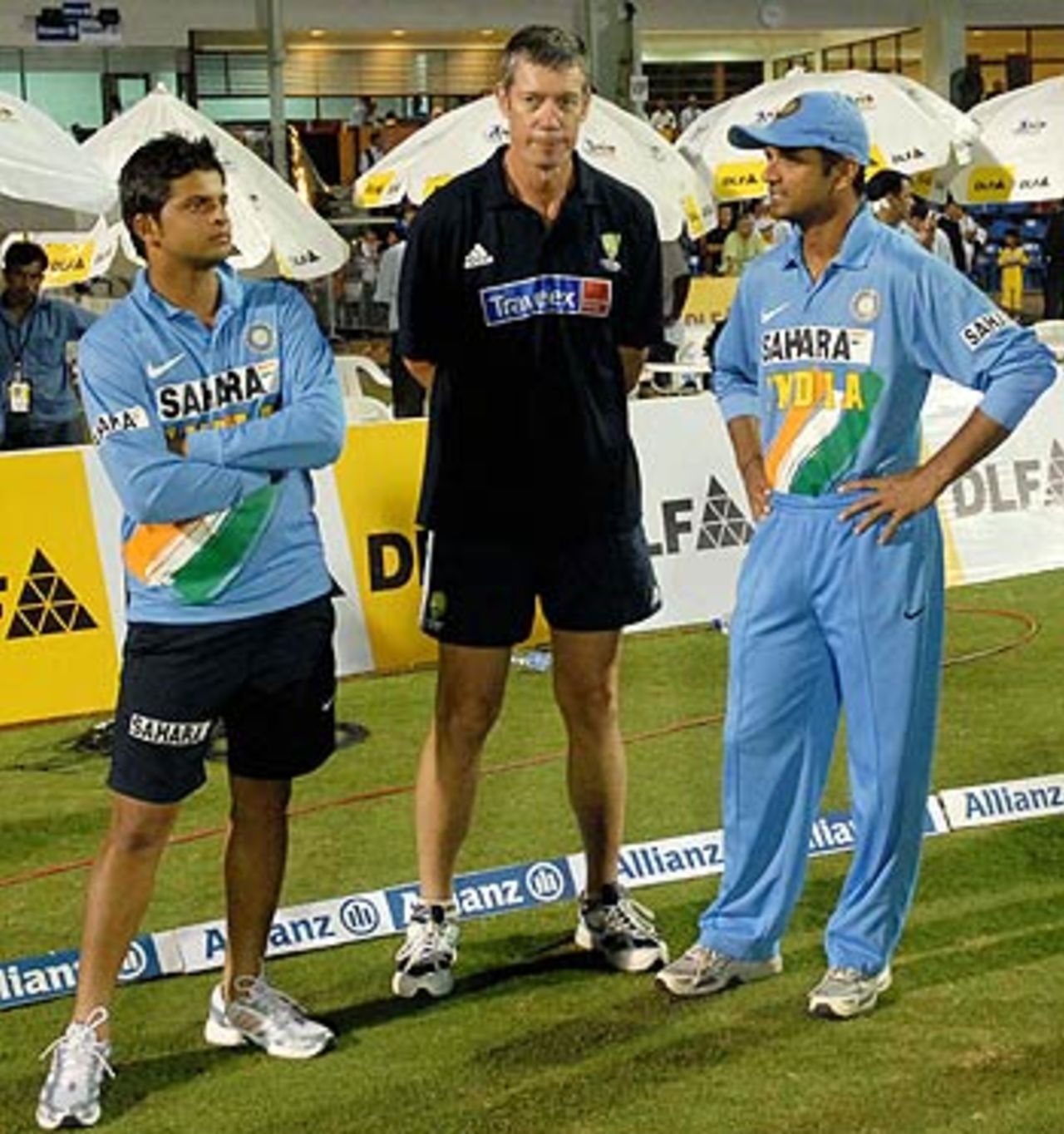 Suresh Raina, John Buchanan and Rahul Dravid share a moment after India's exit from the DLF Cup, Australia v India, 6th match, DLF Cup, Kinrara Oval, Kuala Lumpur, September 22, 2006