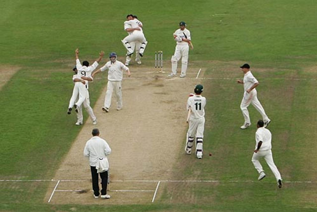 Mushtaq Ahmed is mobbed by his team-mates after taking the final wicket, Sussex v Nottinghamshire, Trent Bridge, September 22, 2006