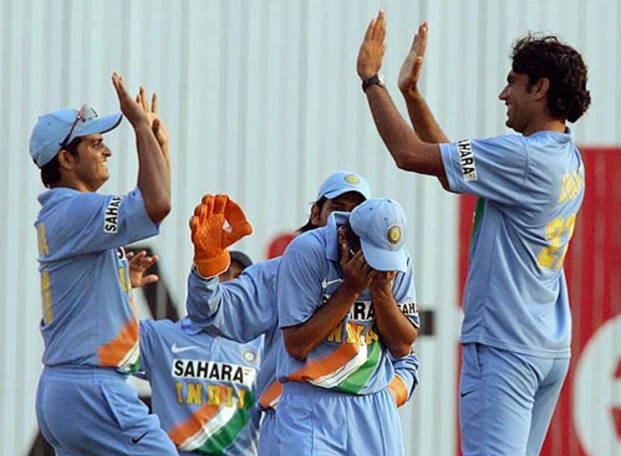 Suresh Raina and Munaf Patel celebrate a wicket, India v West Indiesm DLF Cup, Kuala Lumpur, September 20, 2006
