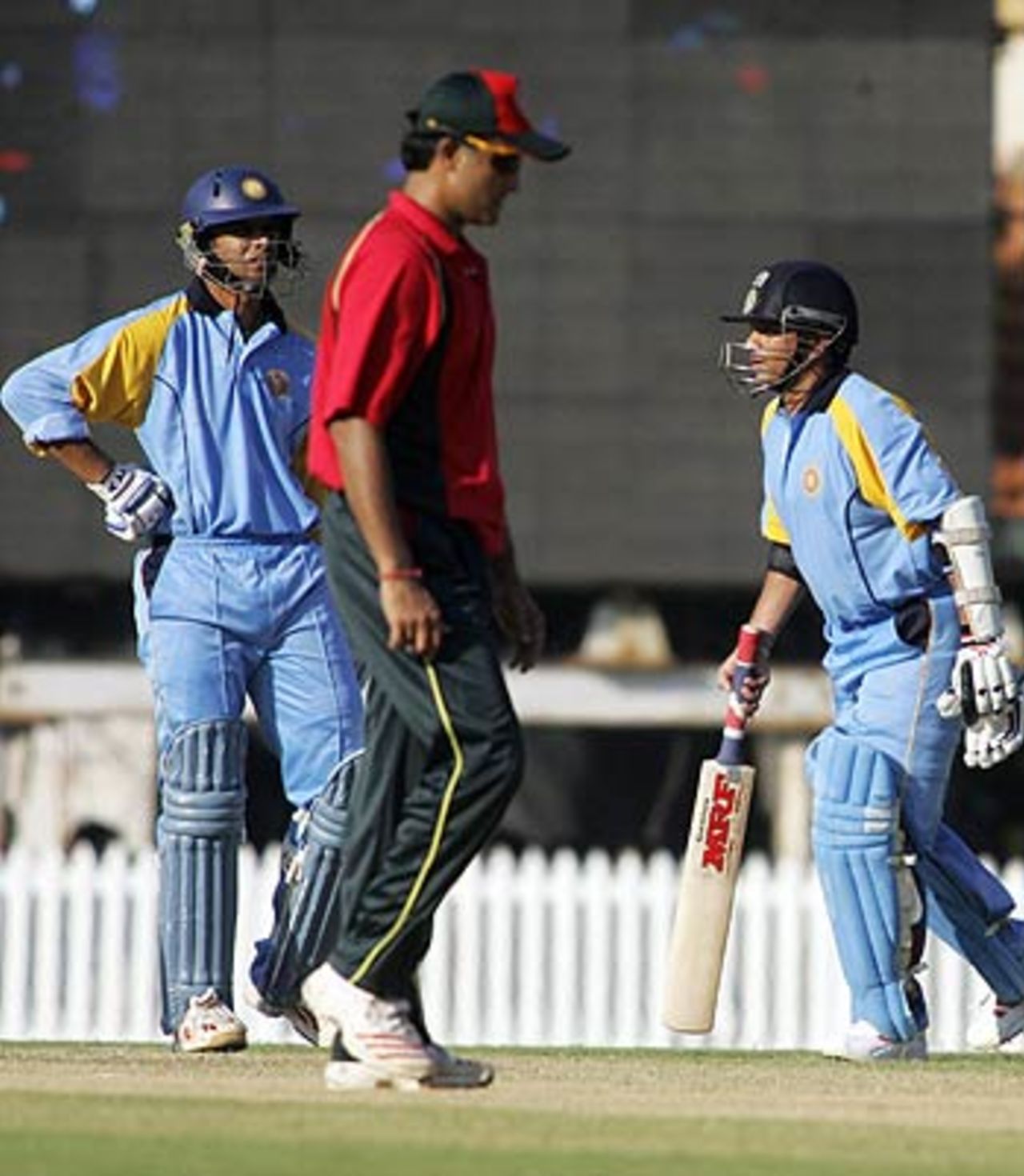 Sachin Tendulkar and Rahul Dravid have a chat as Sourav Ganguly changes his fielding position, India Blue v India Green, Challenger Series, Chennai, October 2, 2006