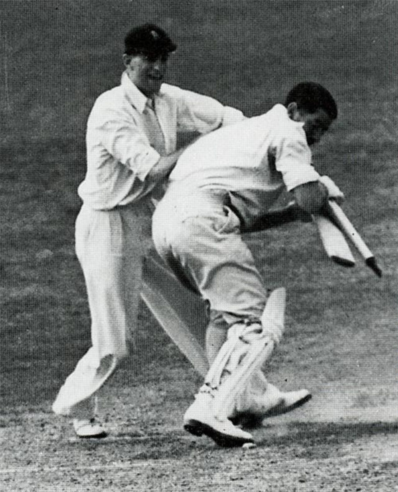 Len Hutton good-naturedly scraps with Chuck Fleetwood-Smith for a souvenir, England v Australia, 5th Test, The Oval, August 24, 1938