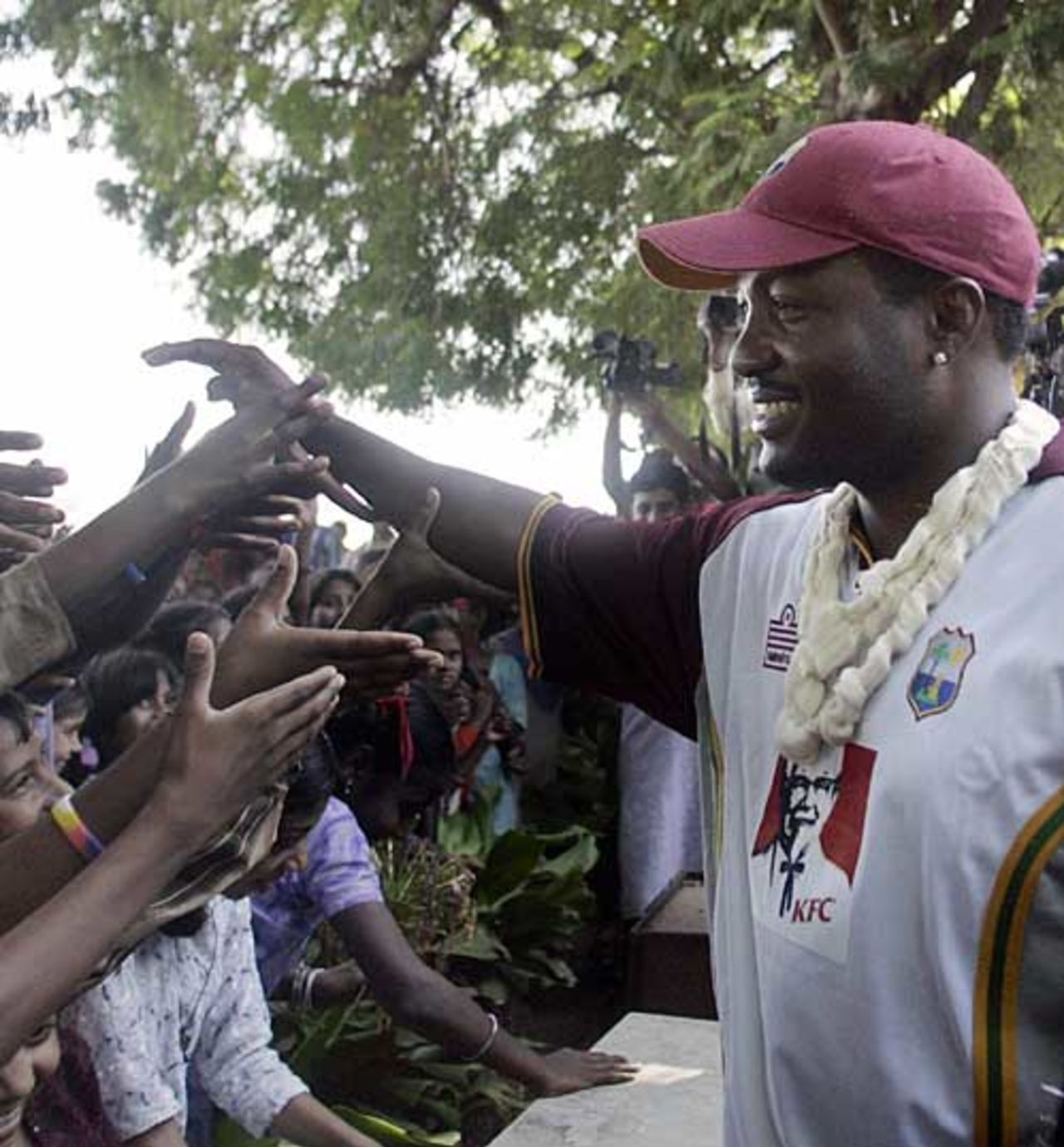 Brian Lara meets children outside the Sabarmati Ashram for Mahatma Gandhi, Ahmedabad, October 6, 2006