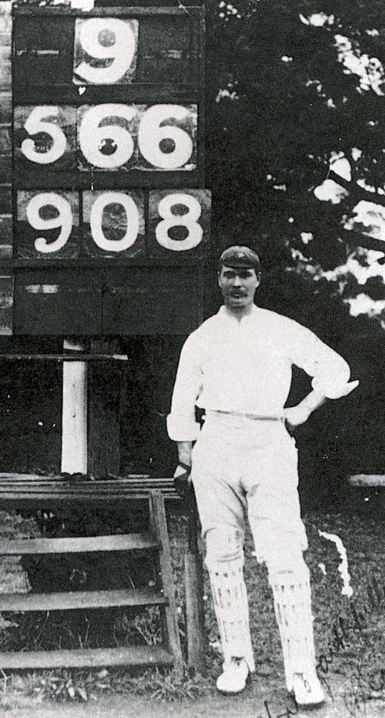 Charles Eady next to the scoreboard after his remarkable innings of 566 in 477 minutes spread over three Saturdays.  The actual team score was 911 but the scorers can be forgiven.  Break-o-Day v Wellington, Hobart, April 5, 1902