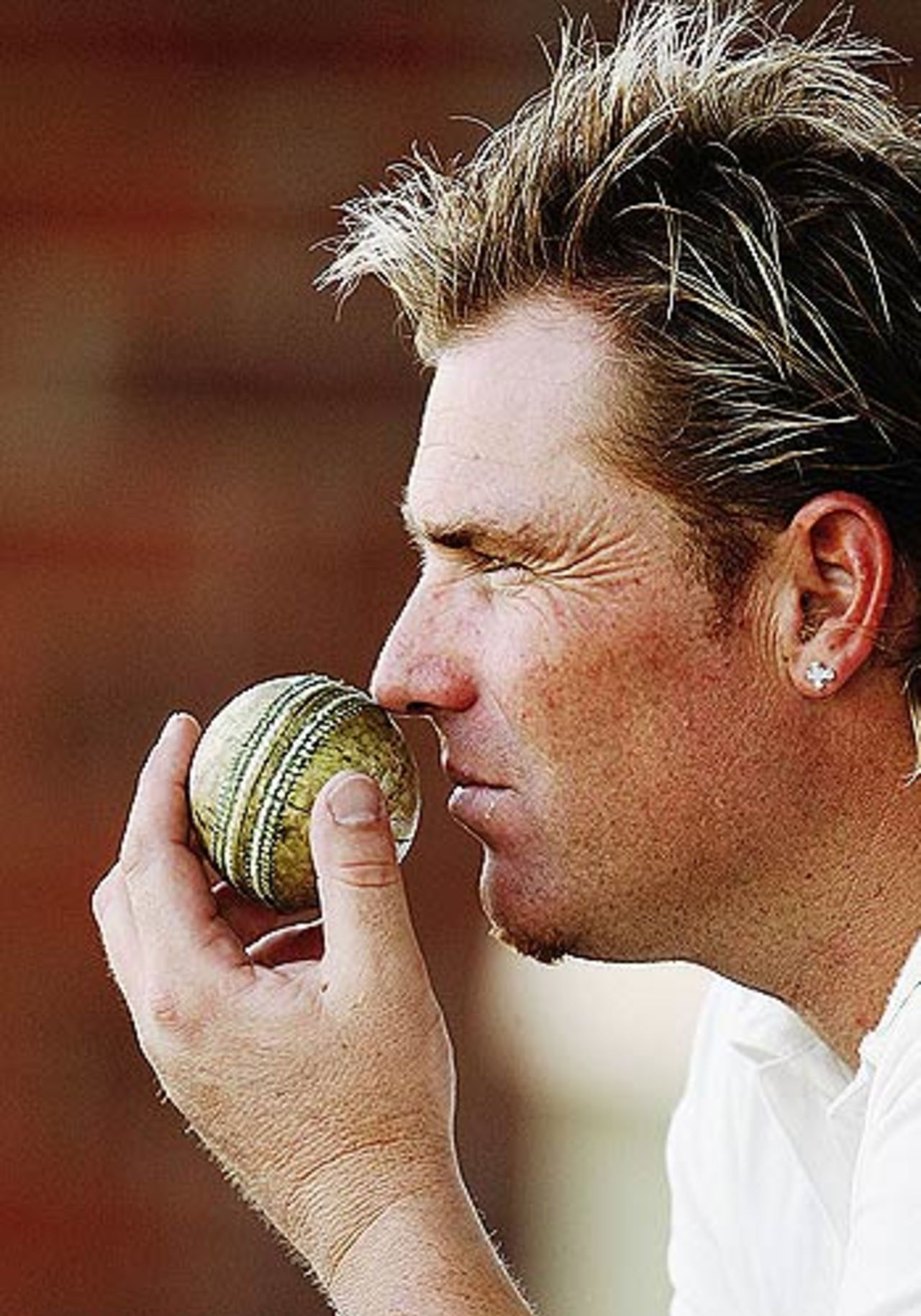 Shane Warne looks on during the Premier Cricket match between St Kilda Saints and Foots-Edgewater Bulldogs at the Junction Oval, October 7, 2006