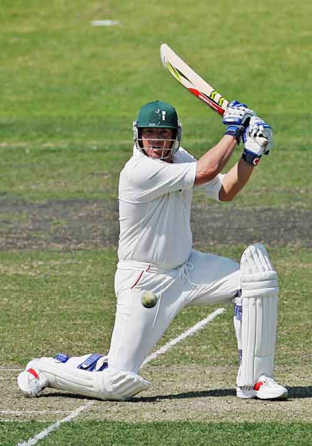 Shane Warne drives for St Kilda on 'Long Live Club Cricket' day, St Kilda Saints v Foots-Edgewater Bulldogs, Junction Oval, October 7, 2006