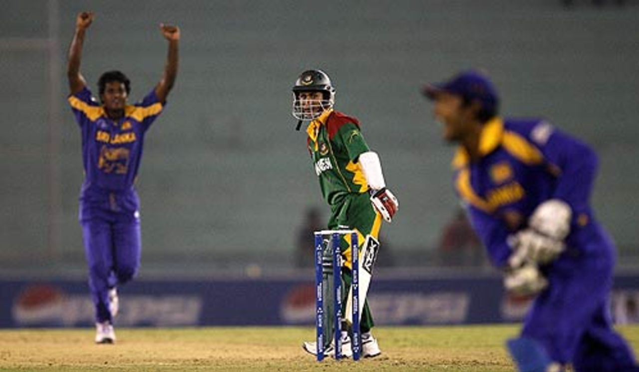 Mohammad Ashraful looks behind to see Kumar Sangakkara take the catch, Bangladesh v Sri Lanka, 1st qualifying match, Champions Trophy, Mohali, October 7, 2006