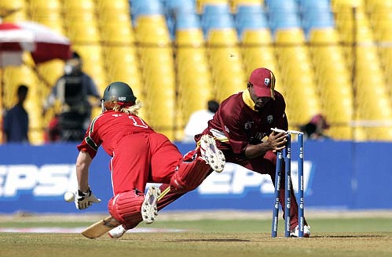 Piet Rinke isn't quick enough to beat the direct hit, West Indies v Zimbabwe, 2nd qualifying match, Champions Trophy, Ahmedabad, October 8, 2006 